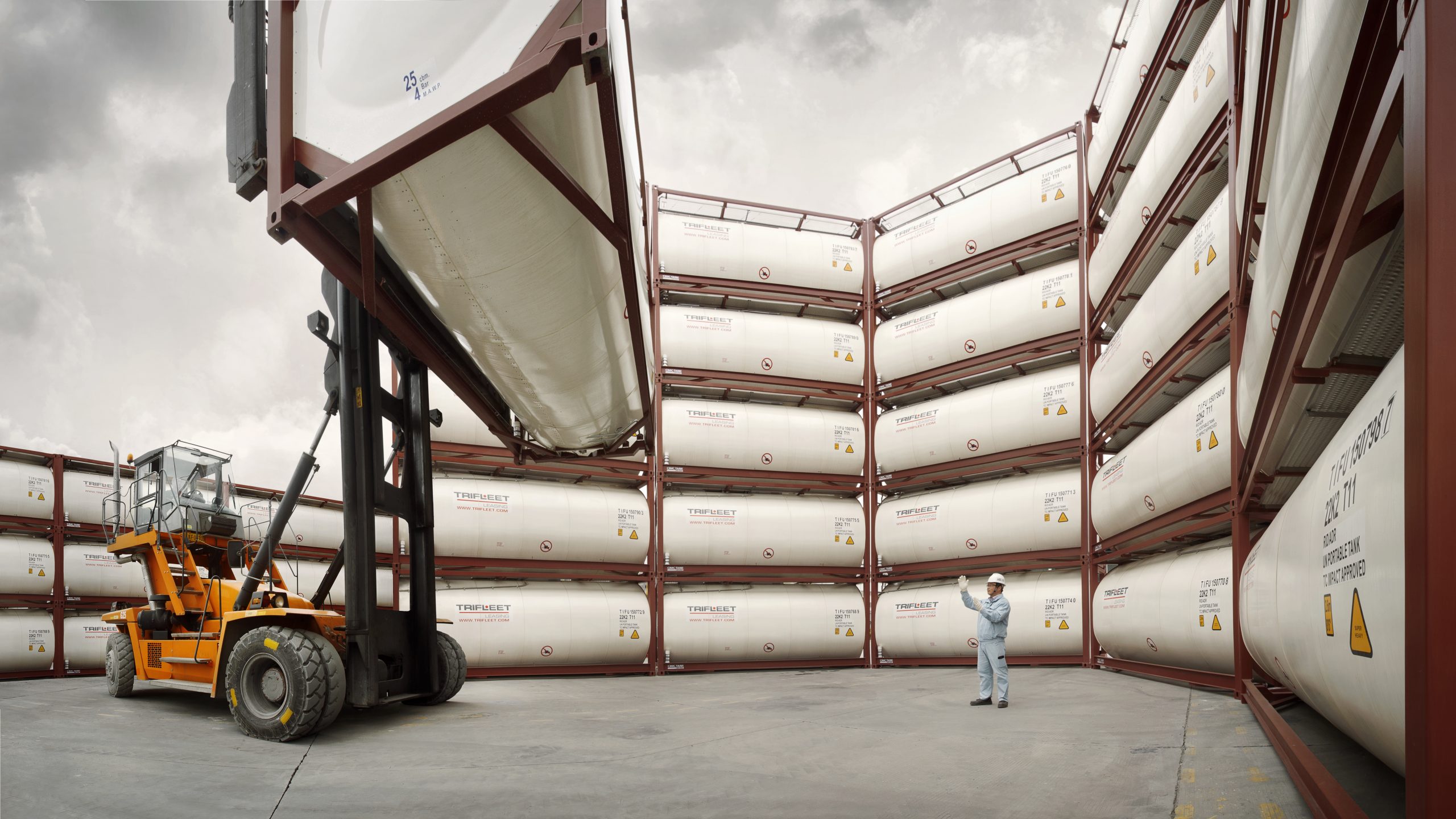 Tank containers being stacked in half circle, industrial photography in China. Photographer Tuomas Harjumaaskola.